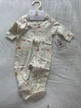 Target Little Snoopy Cream One-Piece Footed Sleeper with Tan Pumpkin Print